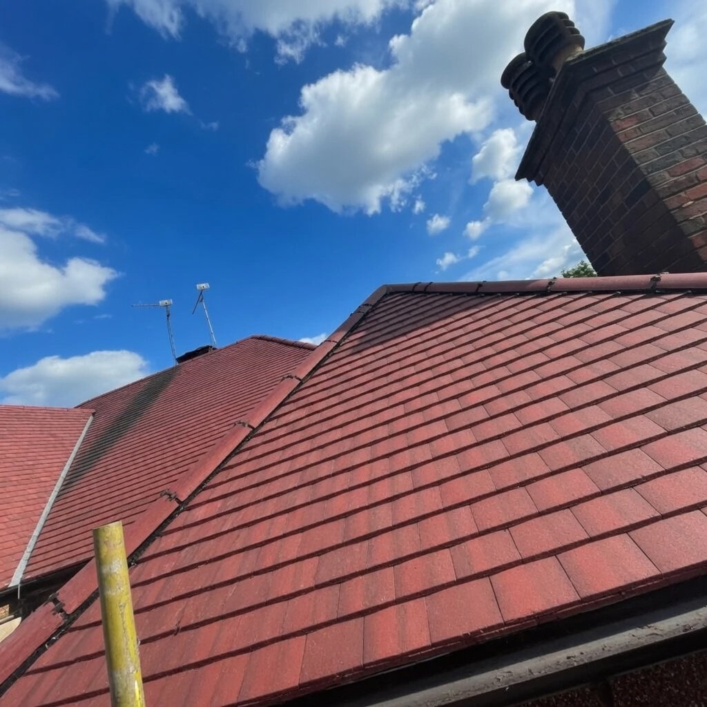 New roof installation in Uxbridge UB8 with modern concrete tiled roof on a semi-detached home